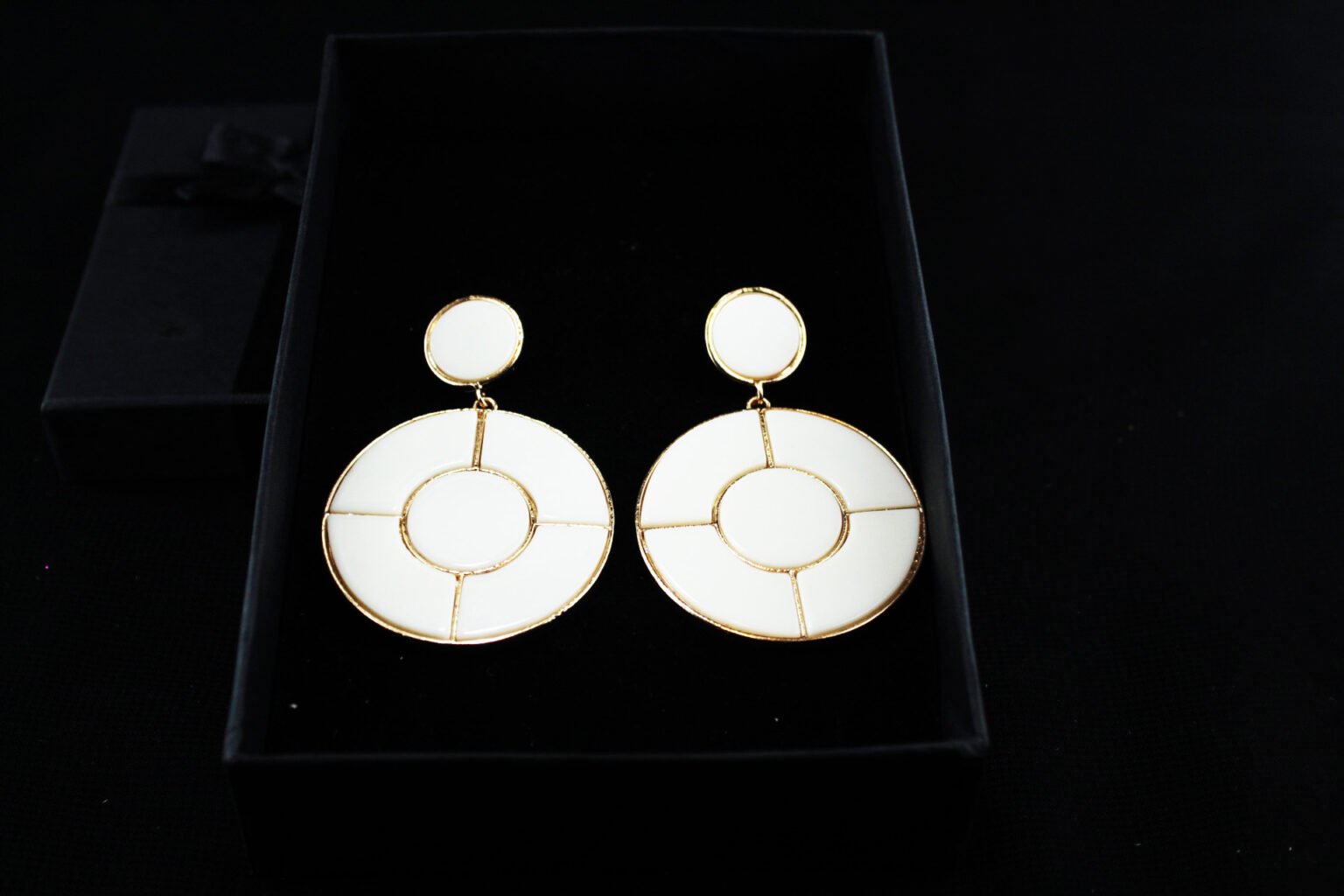 white modern earrings