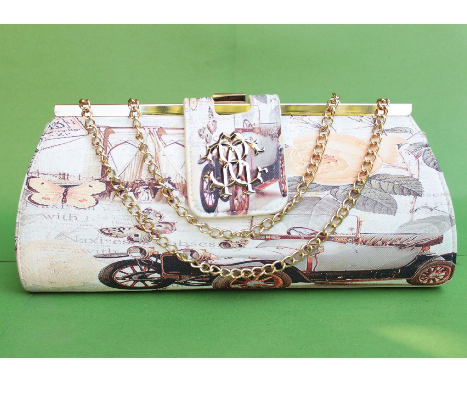 Galorze: Enchantment Obsess is crossbody bag with long golden chain.